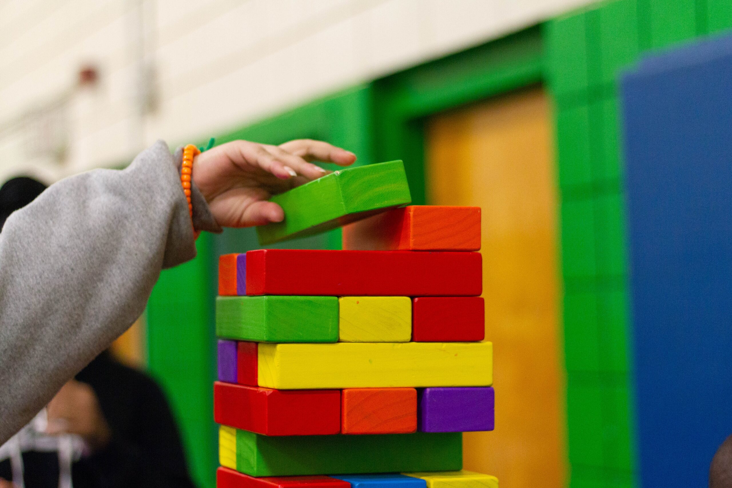 Child with toy blocks. To illustrate writer's block.